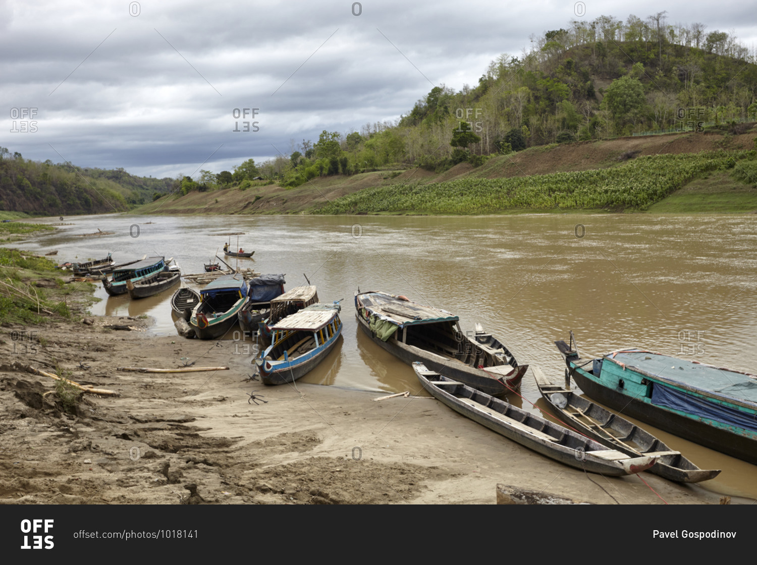 Boats on the banks of the Sangu river near the Bandarban District of Bangladesh