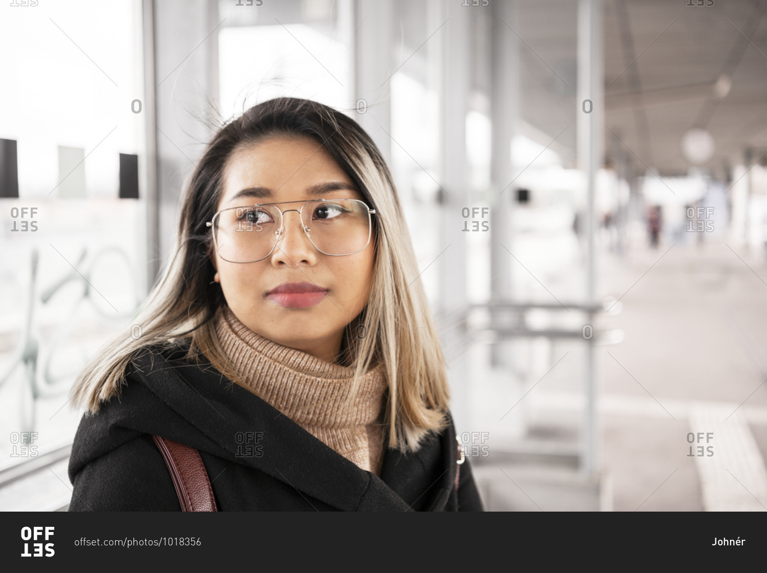 Woman at a train station