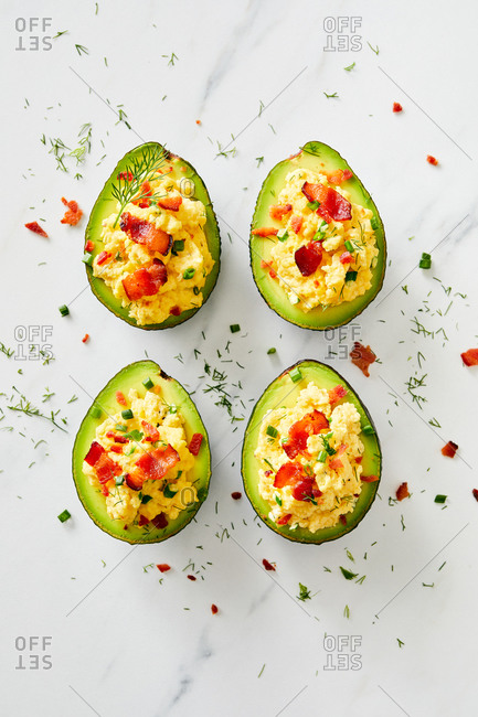 Avocados stuffed with egg and bacon