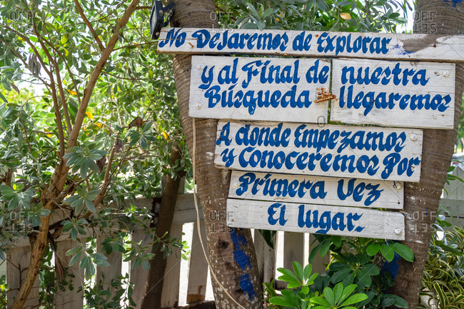 August 24, 2019: Greater Antilles, Dominican Republic, La Altagracia Province, Bayahibe, Decorative wooden sign in a beach cafe in Bayahibe