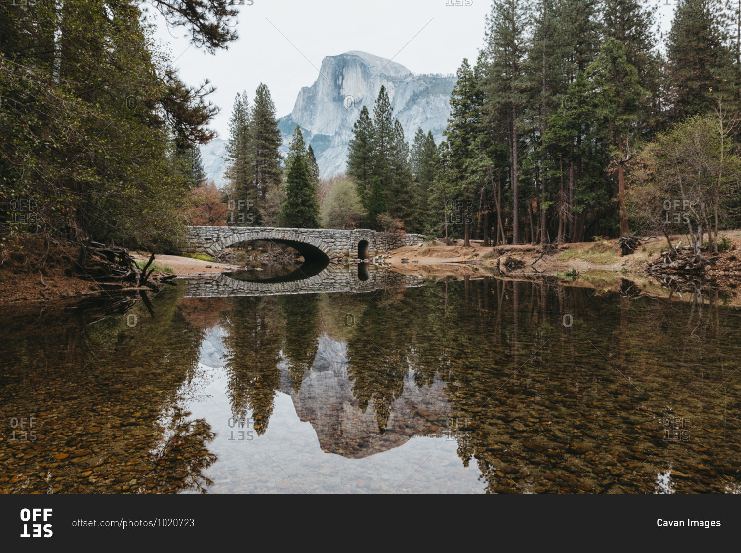 Tranquility on merced river with half dome in distance