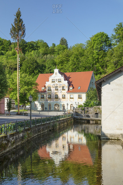 Town hall reflecting in Brenz River, Koenigsbronn, Swabian Jura, Baden-Wuerttemberg, Germany, Europe