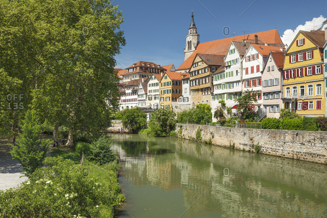 Old town with Stiftskirche church reflecting in Neckar river, Tubingen, Baden-Wurttemberg, Germany, Europe