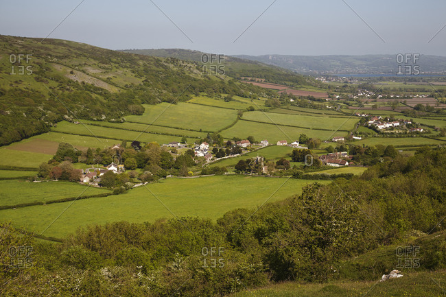 A view across countyside from Crook Peak along the southern slopes of the Mendip Hills, near Cheddar, Somerset, England, United Kingdom, Europe