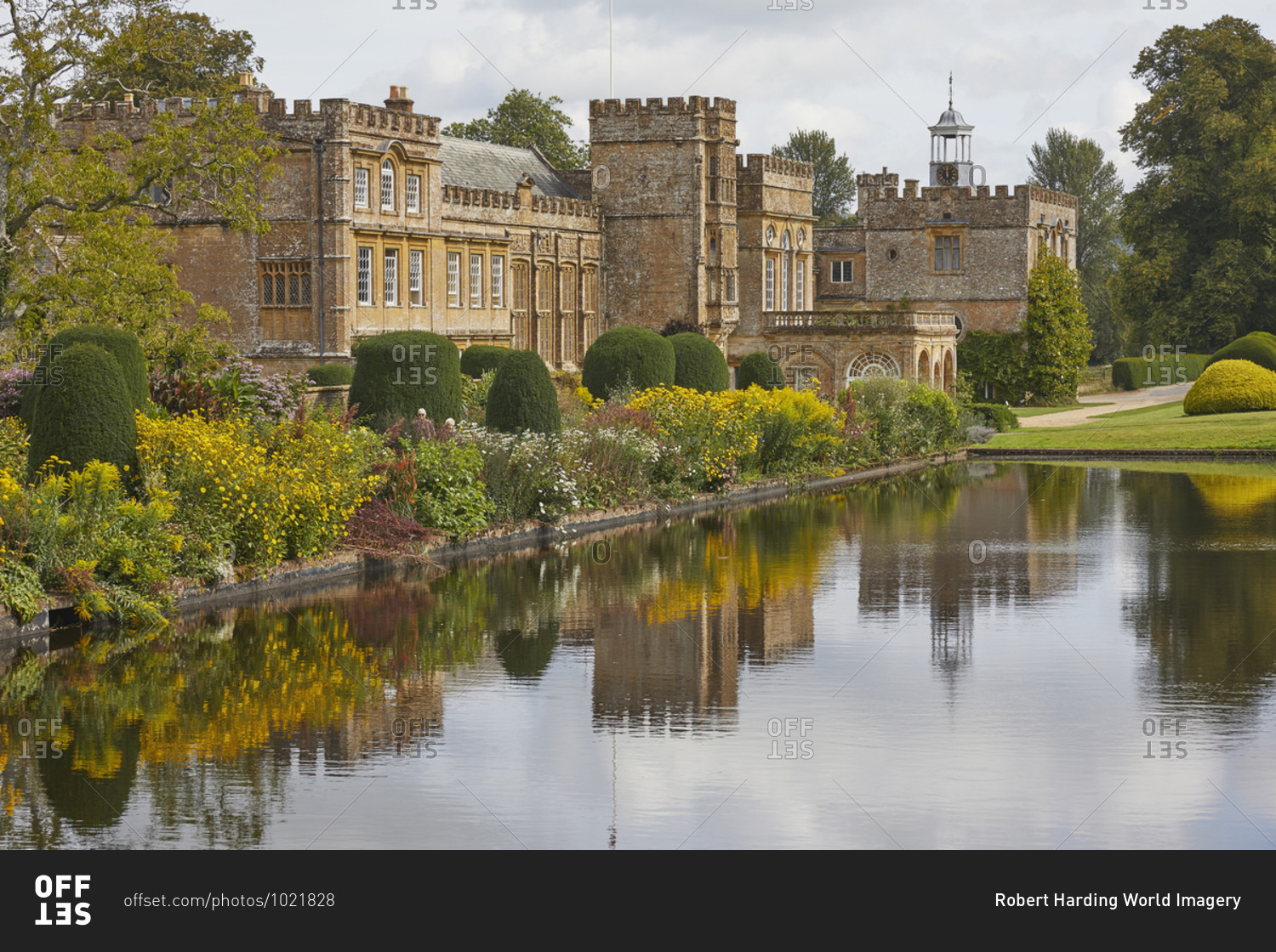 The abbey buildings seen across the Long Pond, at Forde Abbey and Gardens, near Chard, Somerset, England, United Kingdom, Europe