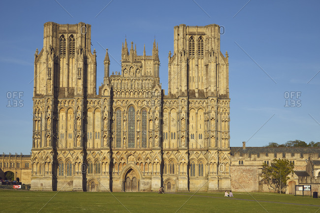 The historic western facade of Wells Cathedral, with its twin square towers, in Wells, Somerset, England, United Kingdom, Europe