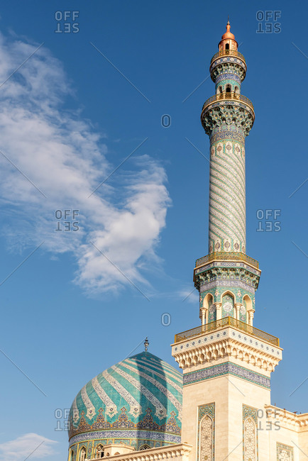 February 28, 2018: Fragment of a mosque dome with decor of colorful mosaic and ornamental tiles in Qom, Iran
