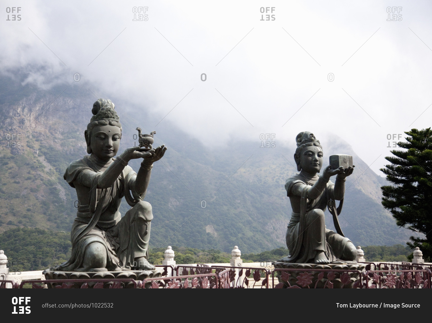 Statues presenting gifts to the Tian Tan Buddha, Ngong Ping, Lantau Island, China, Asia