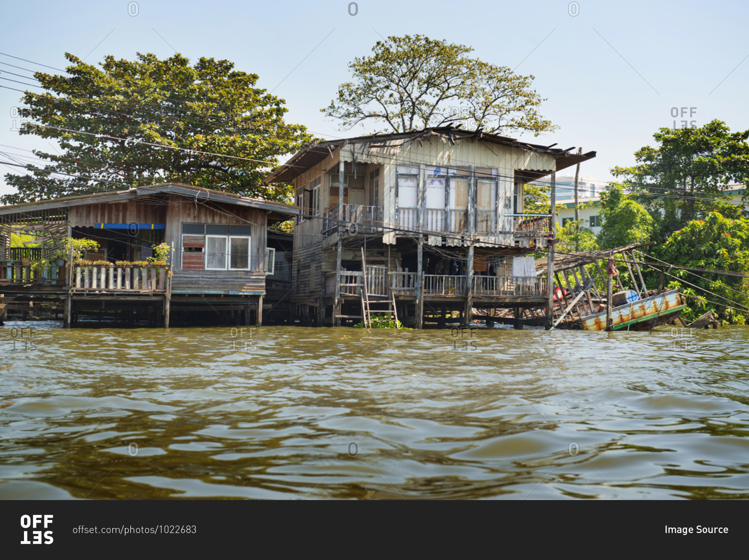 Wooden houses on river, Bangkok, Thailand