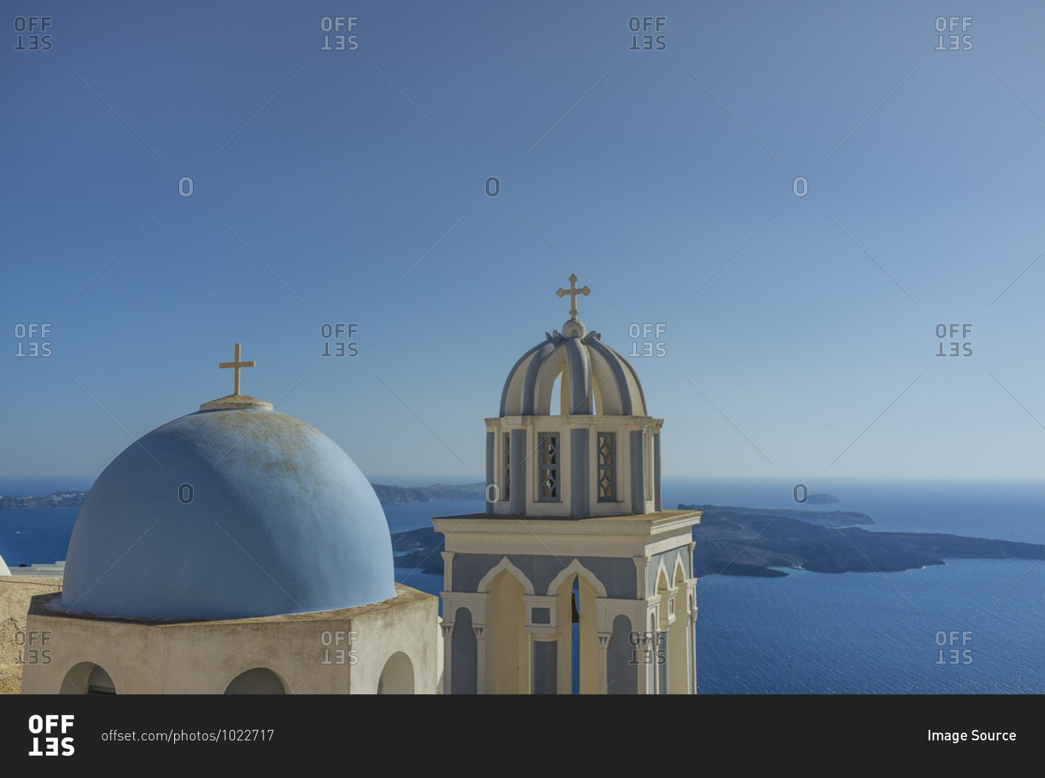 View of domed churches and sea, Oia, Santorini, Greece