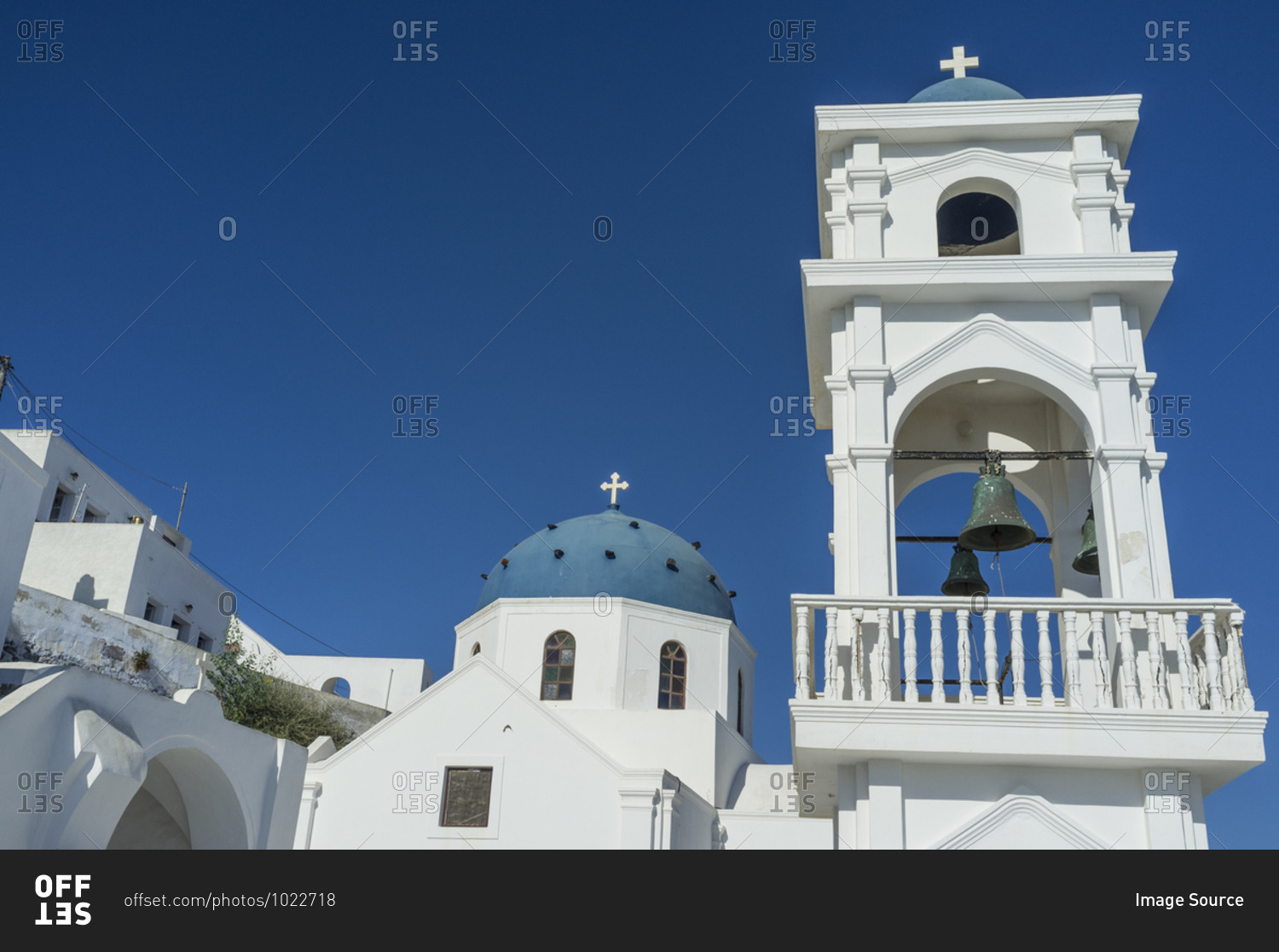 View of domed church and bell tower, Oia, Santorini, Greece
