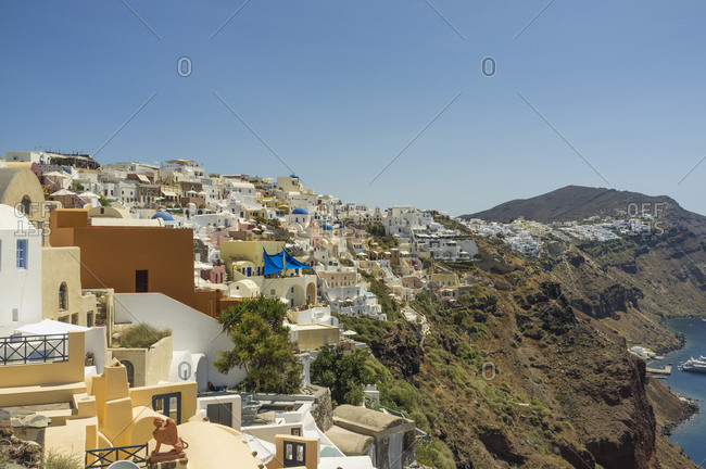 Elevated view of town and coastline, Oia, Santorini, Greece