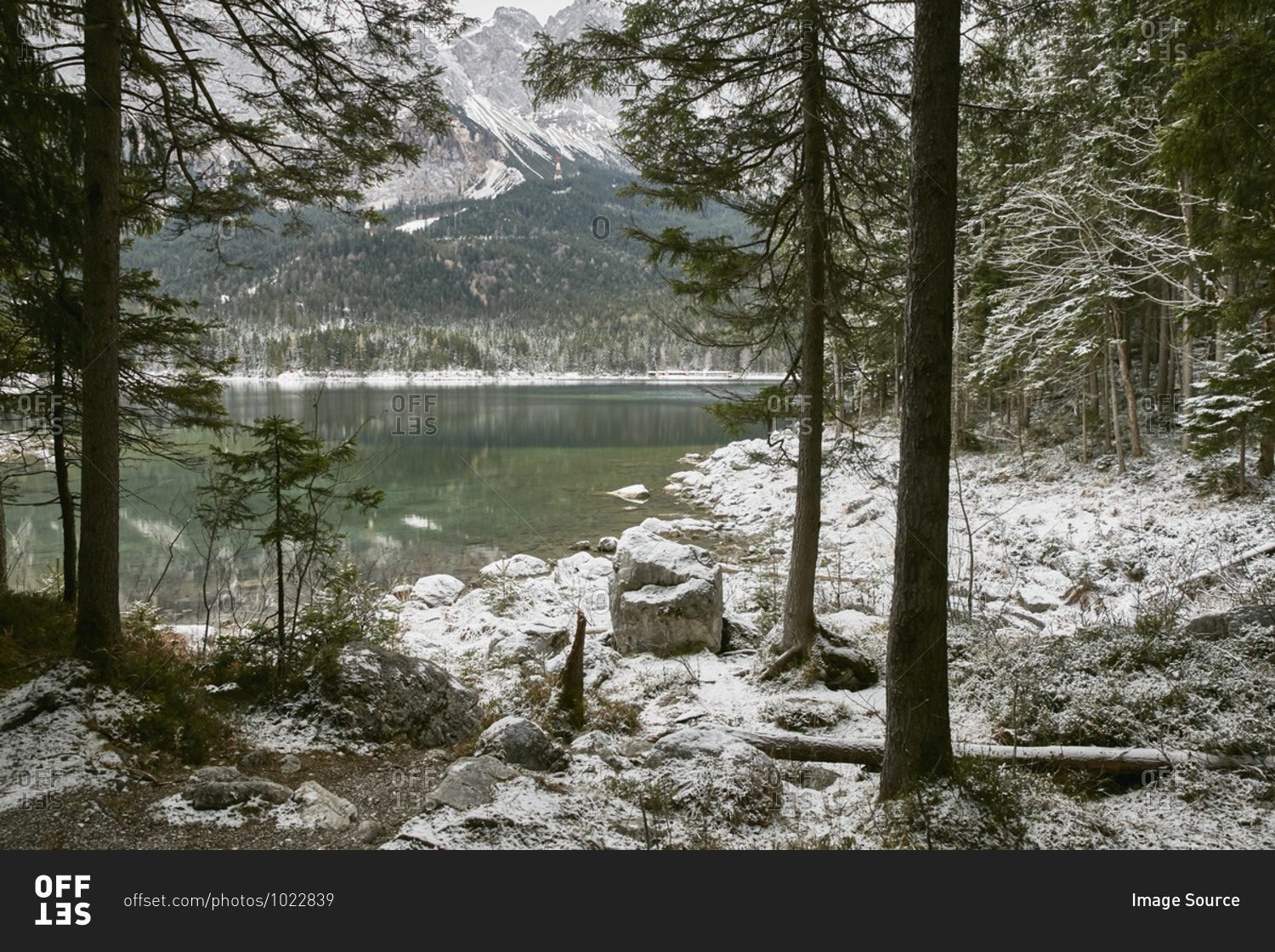 Snowy landscape with forests around Lake Eibsee, Zugspitze, Bavaria, Germany