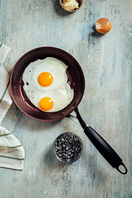 Fried egg. view of two fried eggs on a frying pan. ready to eat with breakfast or lunch