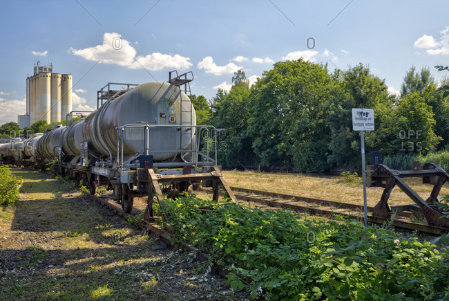 July 16, 2018: Industrial site, railway wagon, closed, Aurora, mill, silo, old Wesermühle, Hameln, Lower Saxony, Germany, Europe