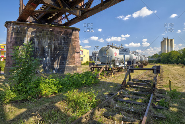 July 16, 2018: Industrial site, railway wagon, closed, Aurora, mill, silo, old Wesermühle, Hameln, Lower Saxony, Germany, Europe