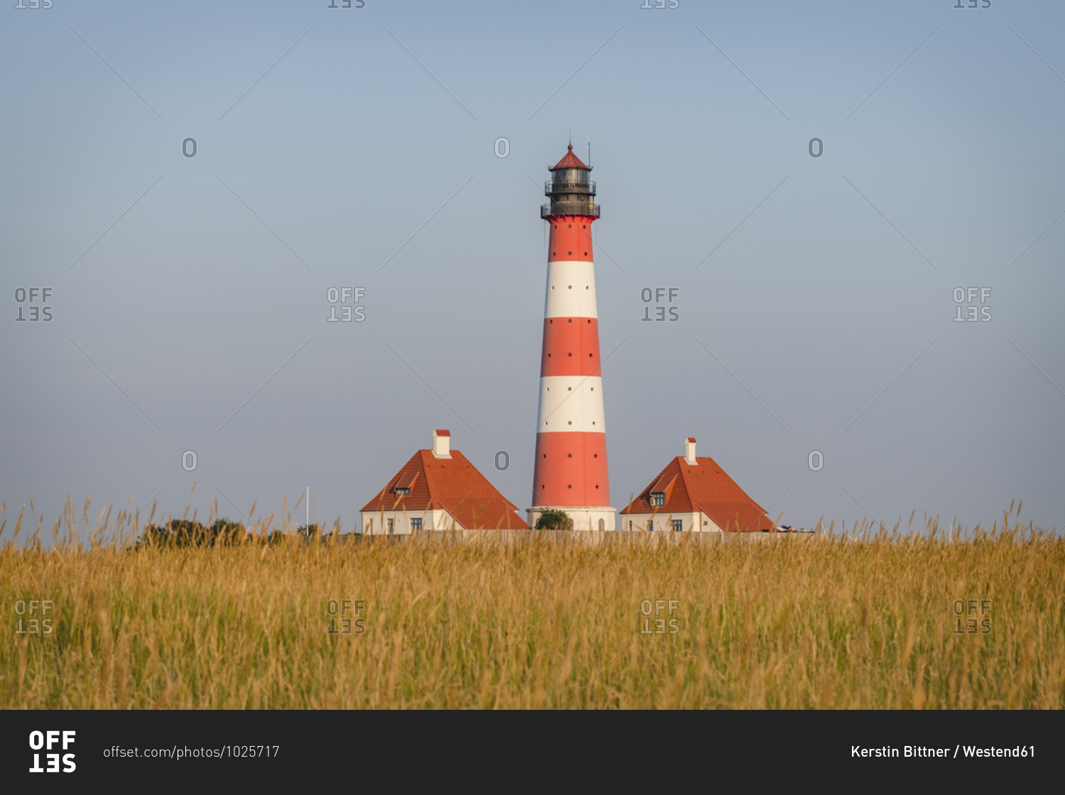 Germany- Schleswig-Holstein- Westerhever- Grassy field in front of Westerheversand Lighthouse