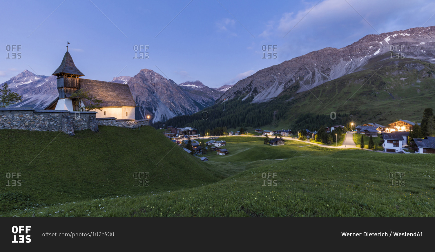 Switzerland- Canton of Grisons- Arosa- Panorama of Plessur Alps and alpine town at summer dusk