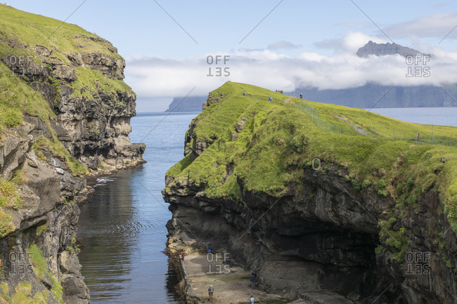 Moss covered rock formations, Faroe Islands