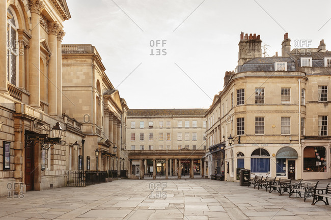 Buildings around empty town square, Bath, Somerset, UK
