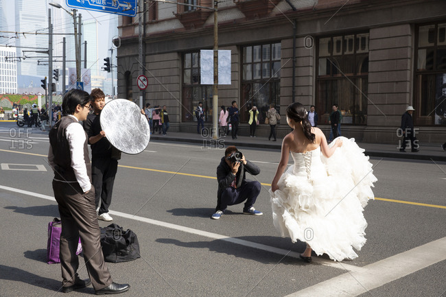 Shanghai, China - March 31, 2016: Wedding photography happening on Nanjing Street