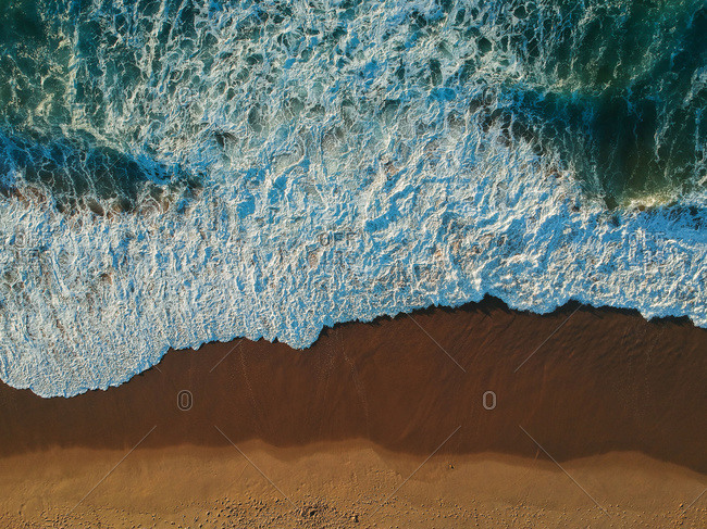 Sand beach aerial, top view of a beautiful sandy beach aerial shot