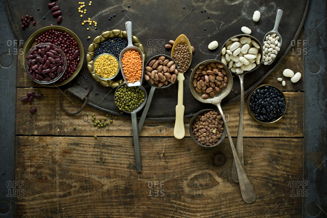 Rustic baking sheet and various types of beans and lentils
