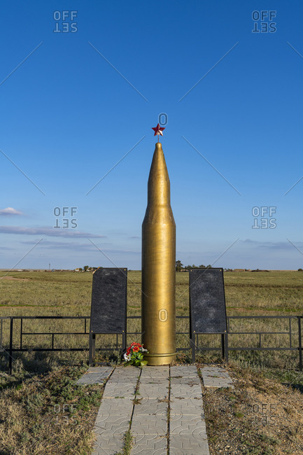 Russia- Republic of Kalmykia- Giant gold colored rifle bullet monument