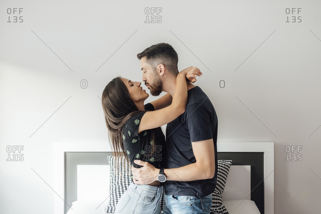 romantic couple bedroom stock photos - OFFSET