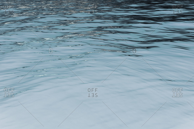 Detail of calm waters of, inverted image, water surface