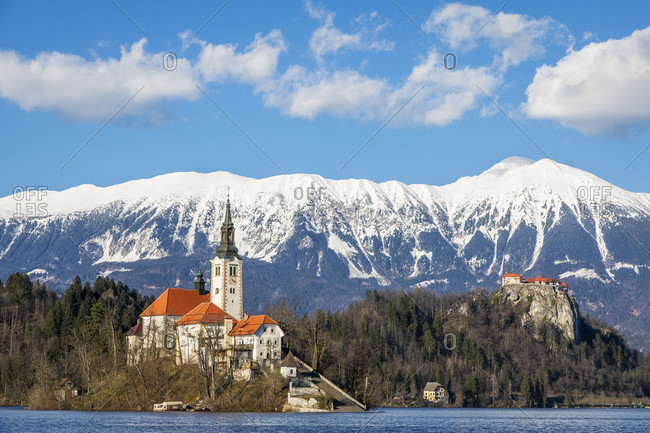 Bled island and lake bled with the snowy karawanks mountains on the background, bled, upper carniola region, slovenia, Europe