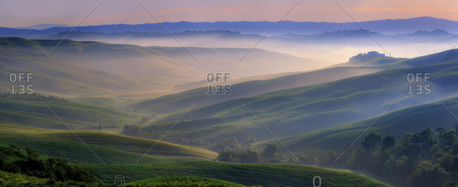 Rolling hills near Asciano at sunset
