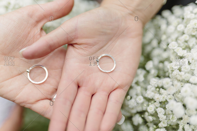 wedding rings on hands
