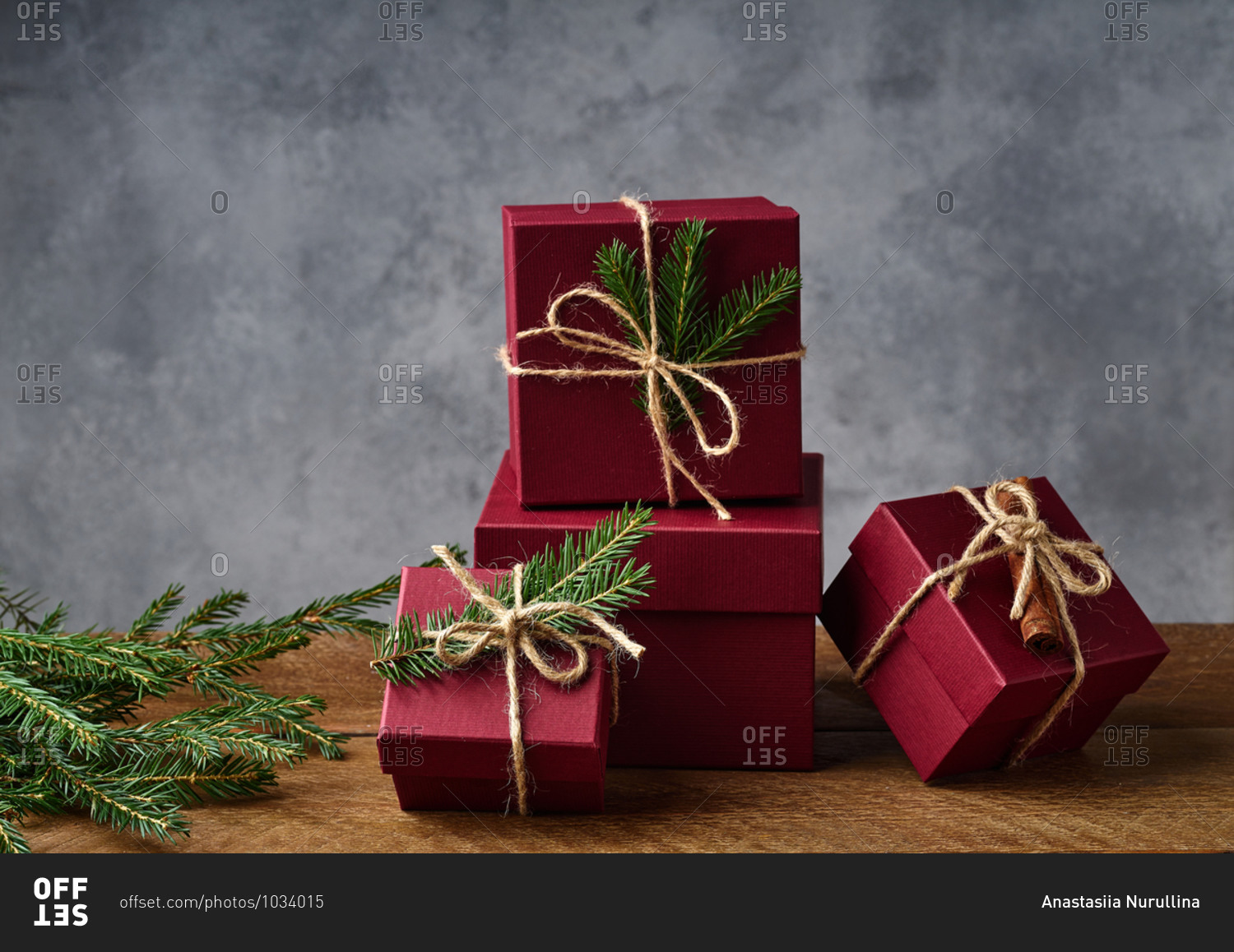 Red boxes with presents on wooden background
