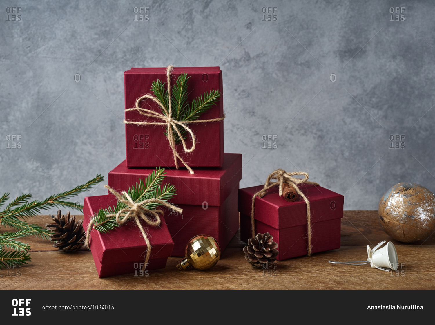 Red boxes with presents on wooden background
