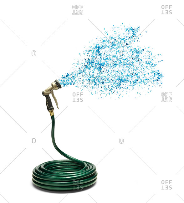 Coiled garden hose spraying glitter from nozzle