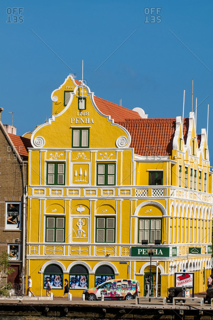 March 14, 2018: Colorful buildings, architecture in capital city Willemstad, UNESCO World Heritage Site, Curacao, ABC Islands, Dutch Antilles, Caribbean, Central America