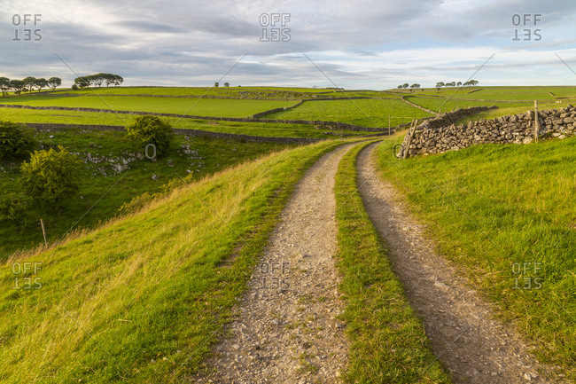 View of track and landscape near Whetton, Tideswell, Peak District National Park, Derbyshire, England, United Kingdom, Europe