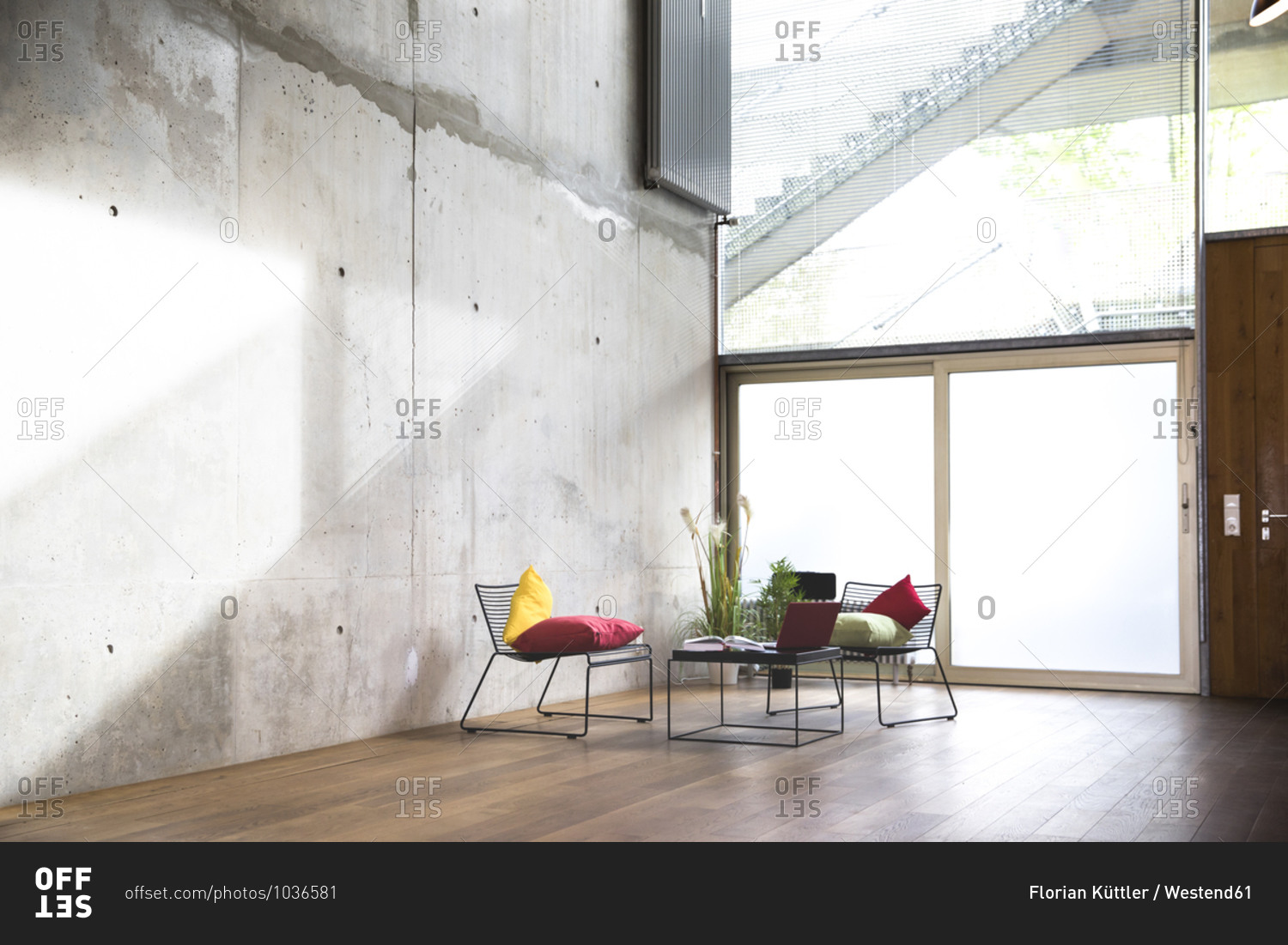 Sitting area in a loft at concrete wall stock photo -
OFFSET