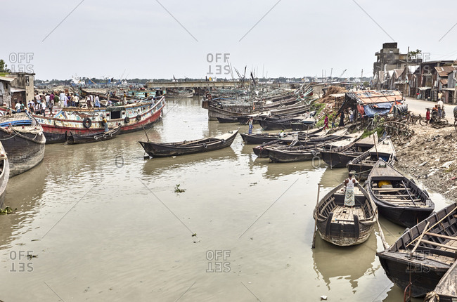 Chittagong, Bangladesh - May 13, 2013: View of old ships and boats anchored at Chaktai Khal on the River Karnaphuli