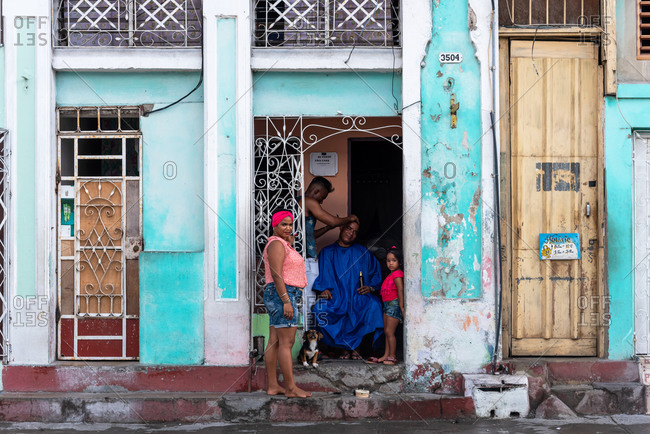 August 28, 2019: Home hairdresser in the streets of Cienfugos. Cienfuegos, Cuba
