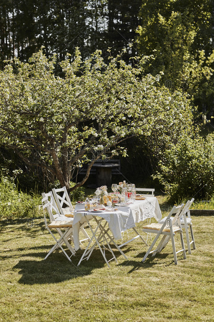 Table set in garden. Detailed shot.