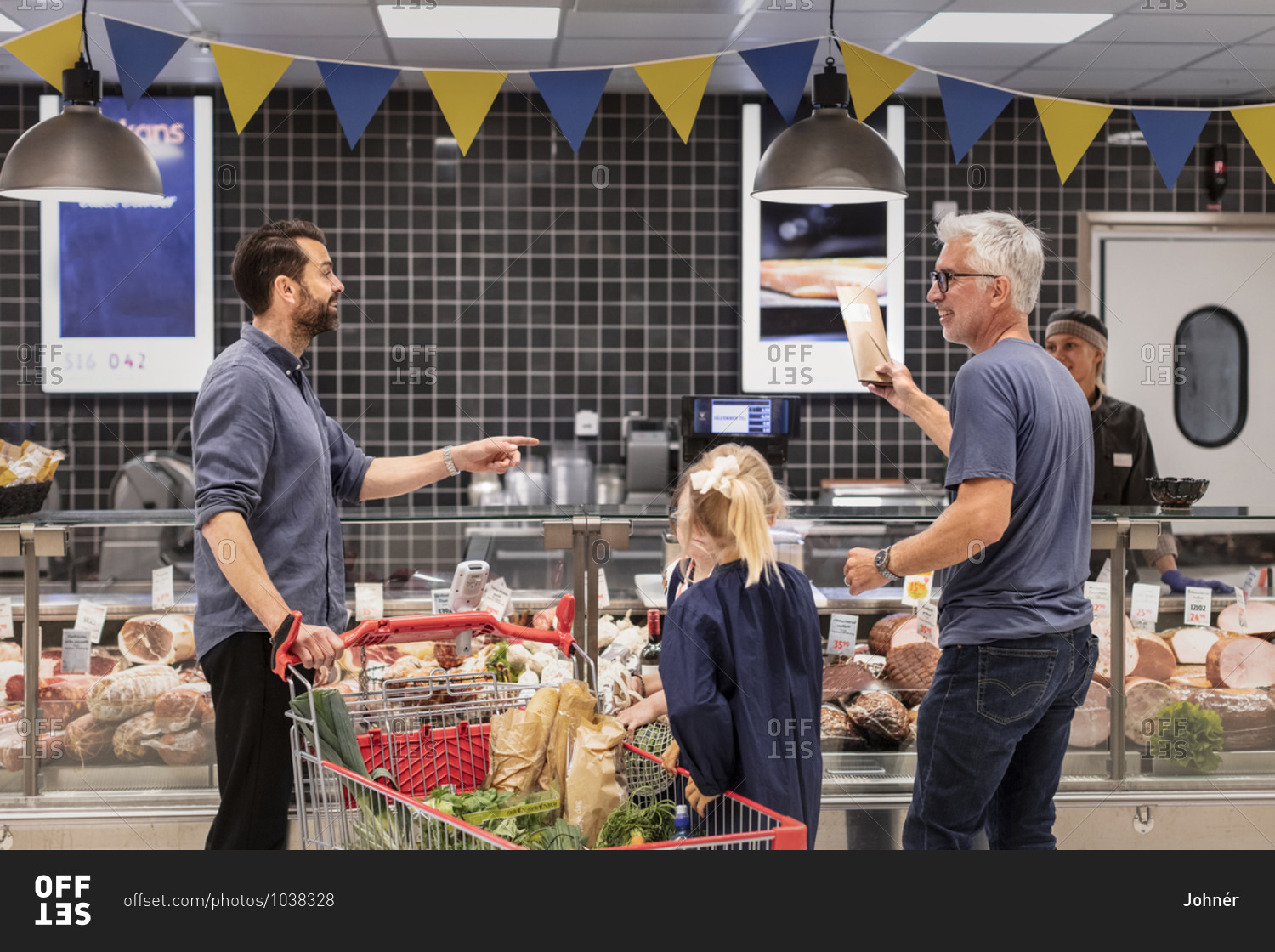 Customers talking in supermarket. Detailed shot.