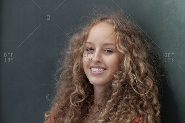 Portrait of happy teenage girl wearing braces