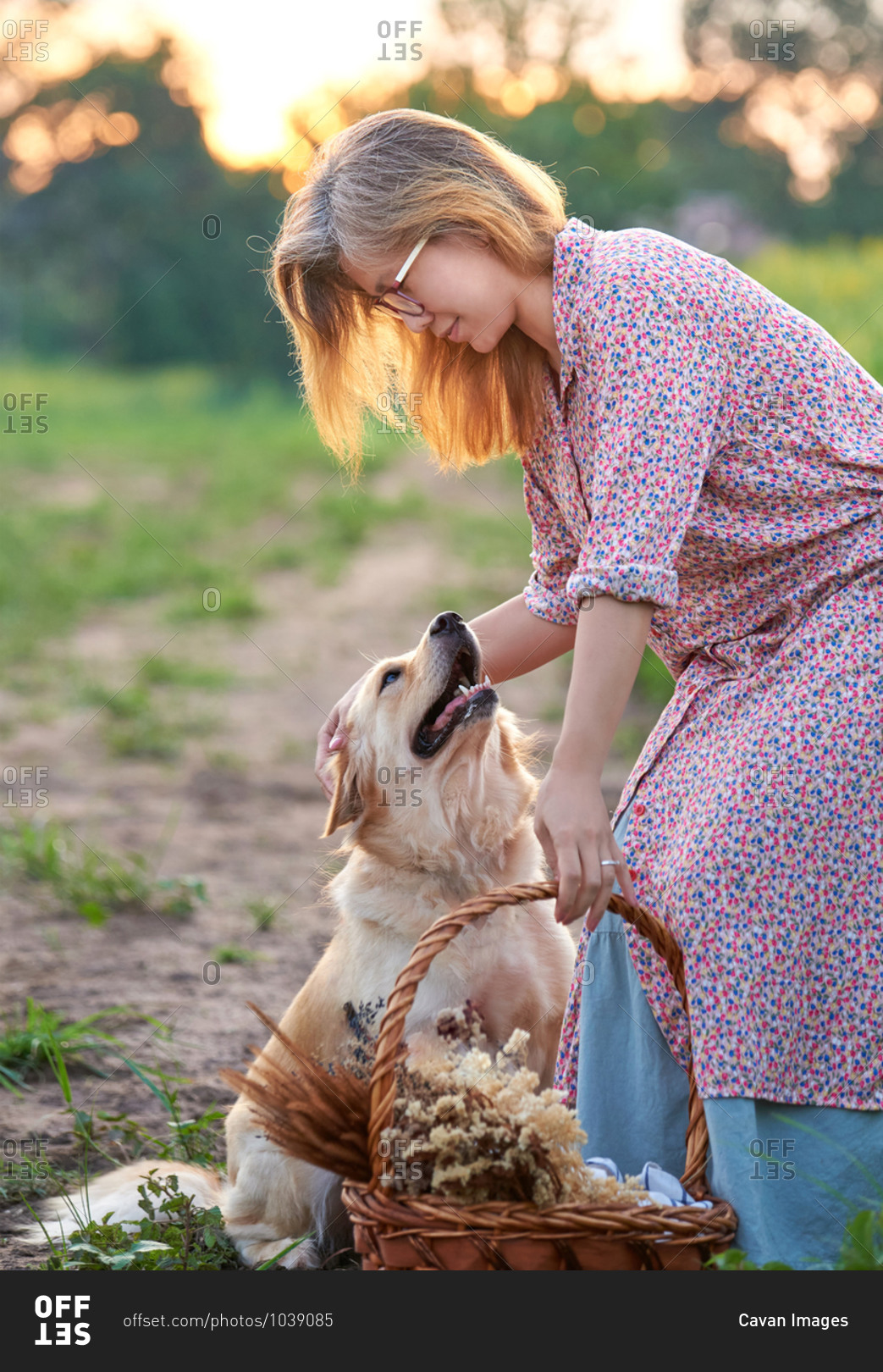 Woman and dog in the rural farm