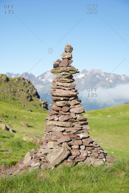 Cairn to indicate the right path in Tena Valley, Huesca province in Aragon, Pyrenees in Spain.