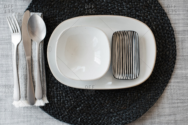 Black and white dinner table place setting