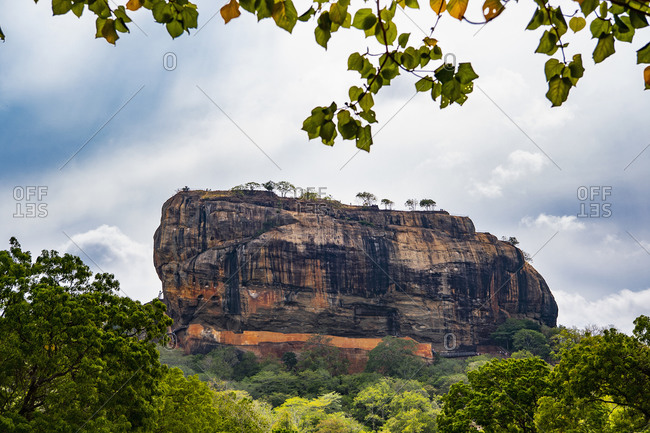 The rock fortress at Sigiriya in Sri Lanka stock photo - OFFSET