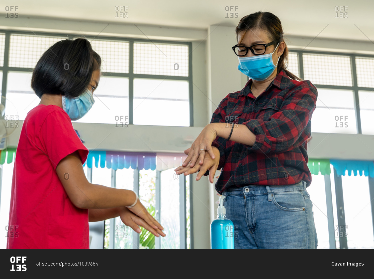 Teacher wearing protective mask to Protect Against Covid-19