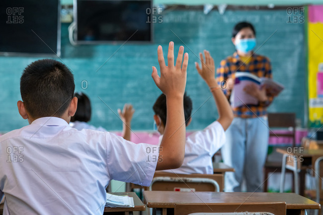 Group of Asian elementary students wearing protective masks